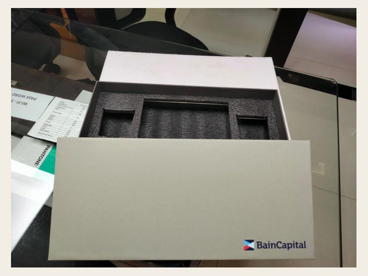 Corporate rigid box with a recessed foam insert